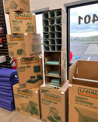 organized storage unit with stacked boxes and furniture